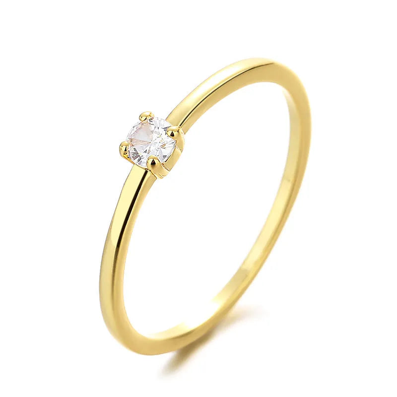 Copper geometric circle ring for women with a single diamond style in blue, green, red, or white on a size guide.