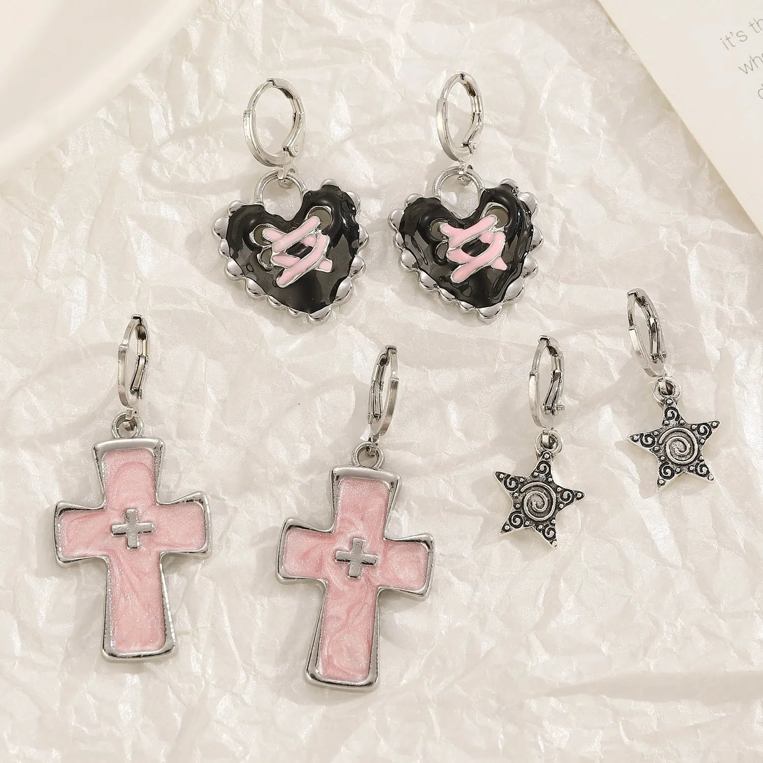 Women's alloy cross crystal earrings in white, black, and silver with geometric and character designs