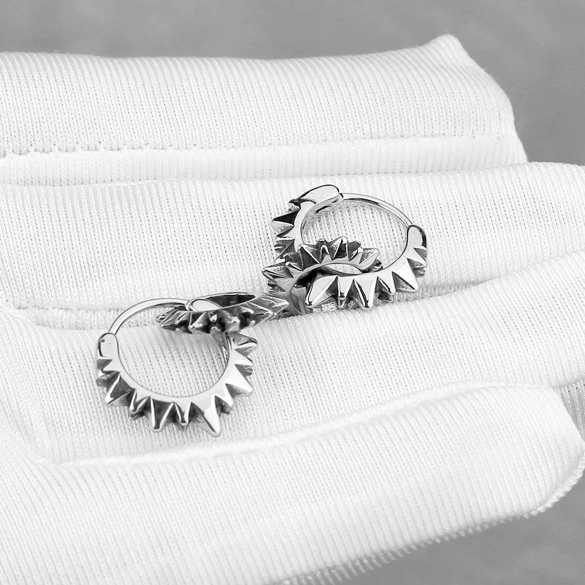Stainless steel round ring earrings with polished finish in steel colour