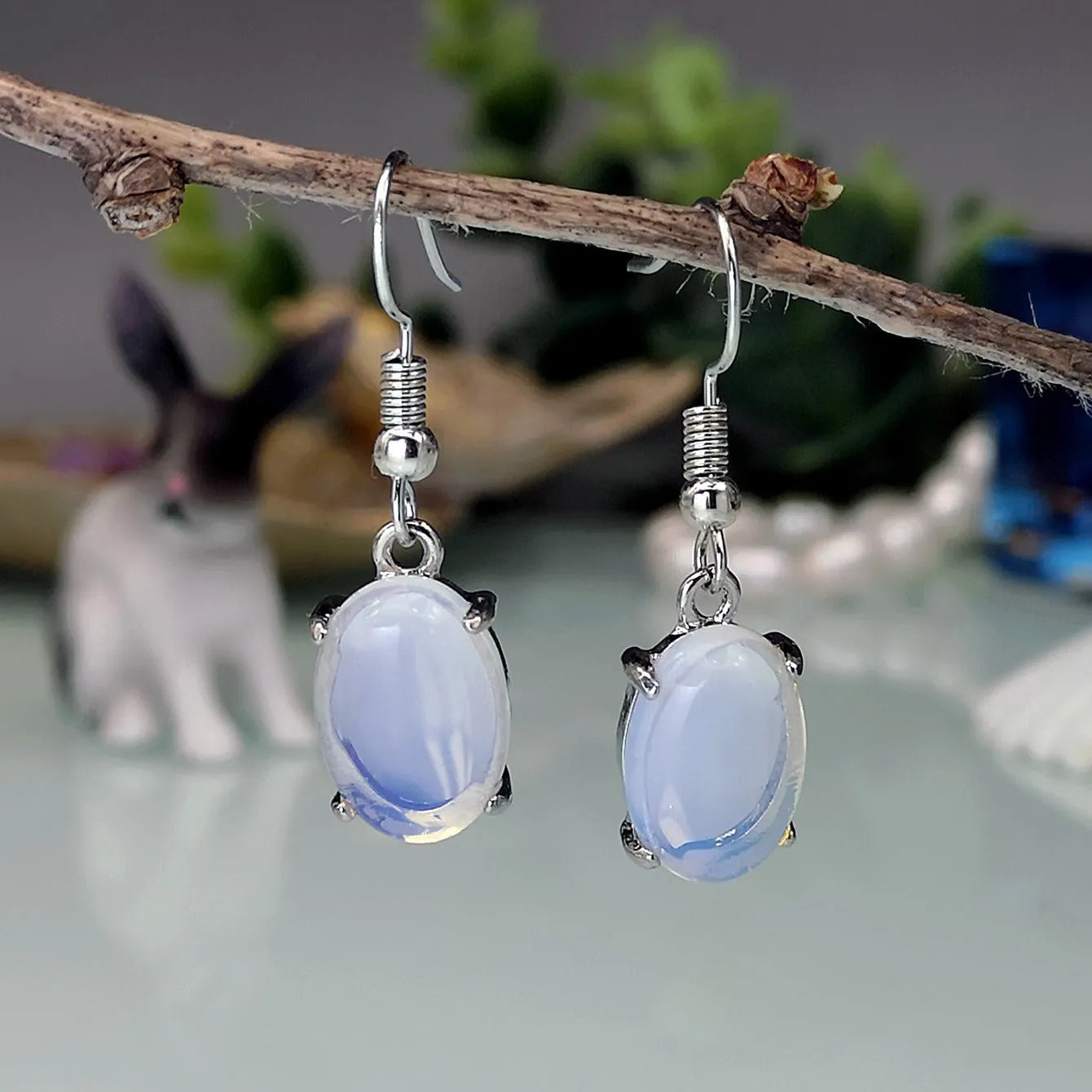 Moonlight white opal drop earrings with ellipse shape and alloy electroplated finish