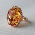 Adjustable alloy beeswax ring with a genuine amber stone in a vintage ethnic style.