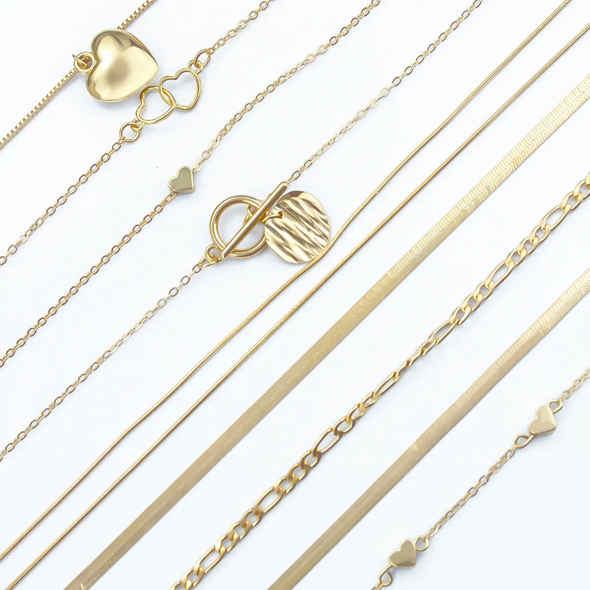 Gold electroplated women's necklace set with 10 jewellery ornaments on snake bone chain