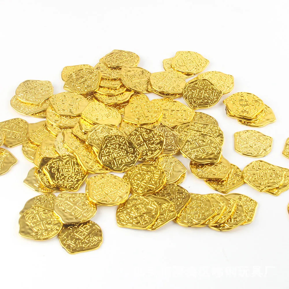 100 replica Roman pirate coins in gold, silver, and bronze finishes displayed together
