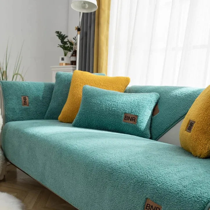 Machine washable lambswool-style sofa cover in solid colour protecting furniture