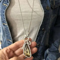 Women's long geometric pendant necklace with plaid pattern and snake bone chain in alloy