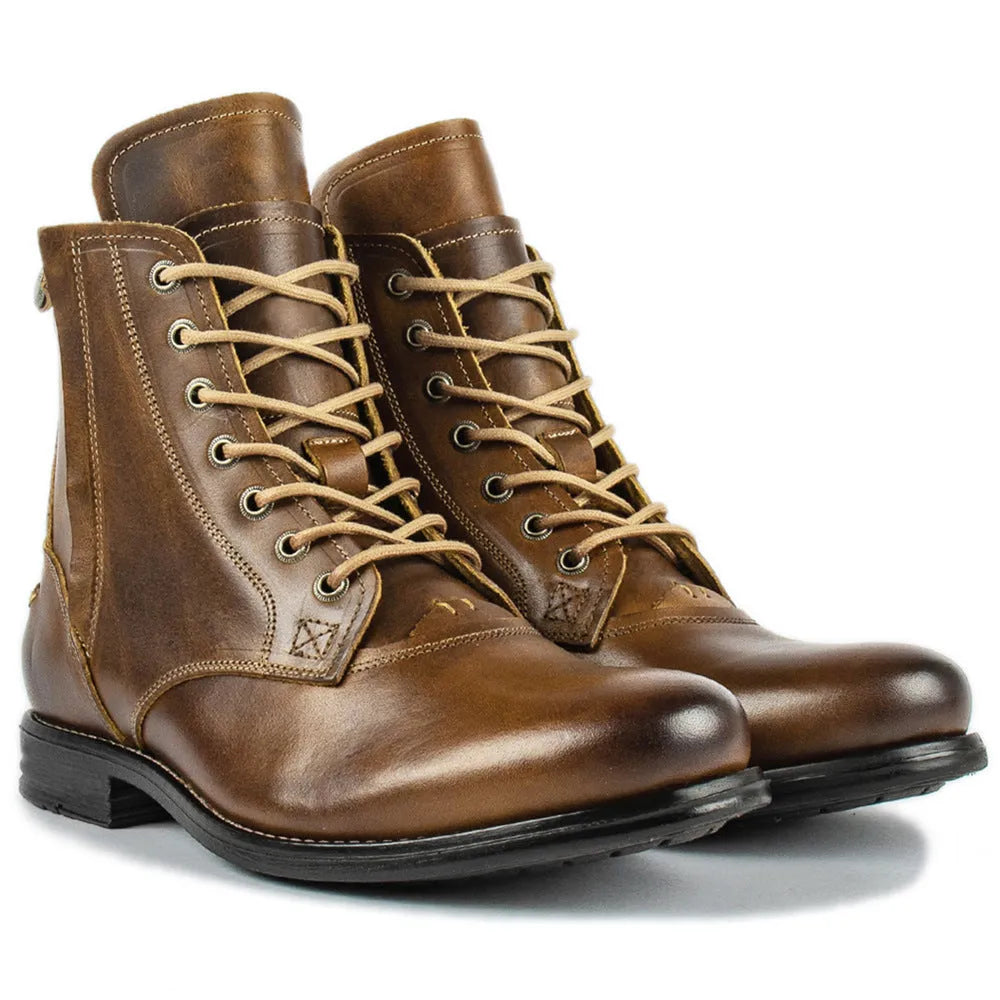Black Knight Series leather boot with side zip and low heel on a grey background.