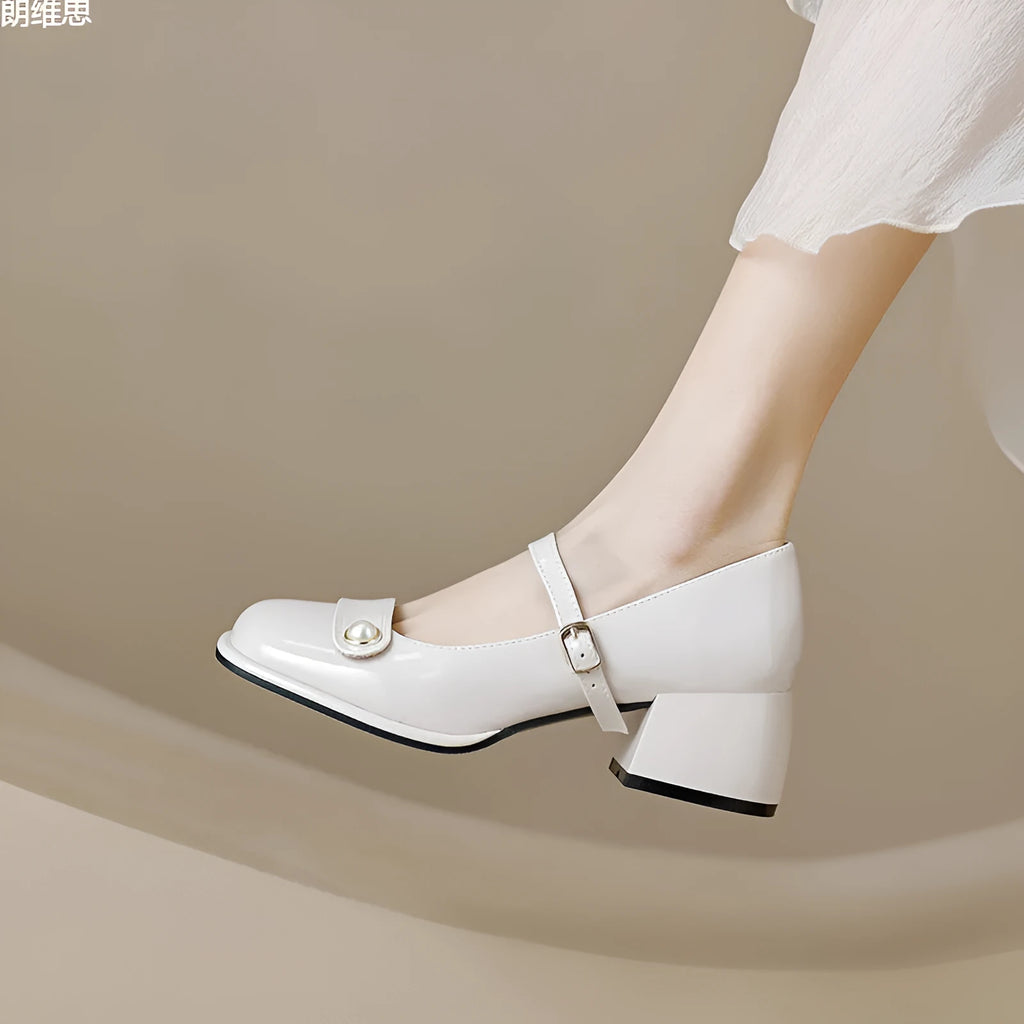 Women's patent leather chunky heel pumps with buckle closure and square toe