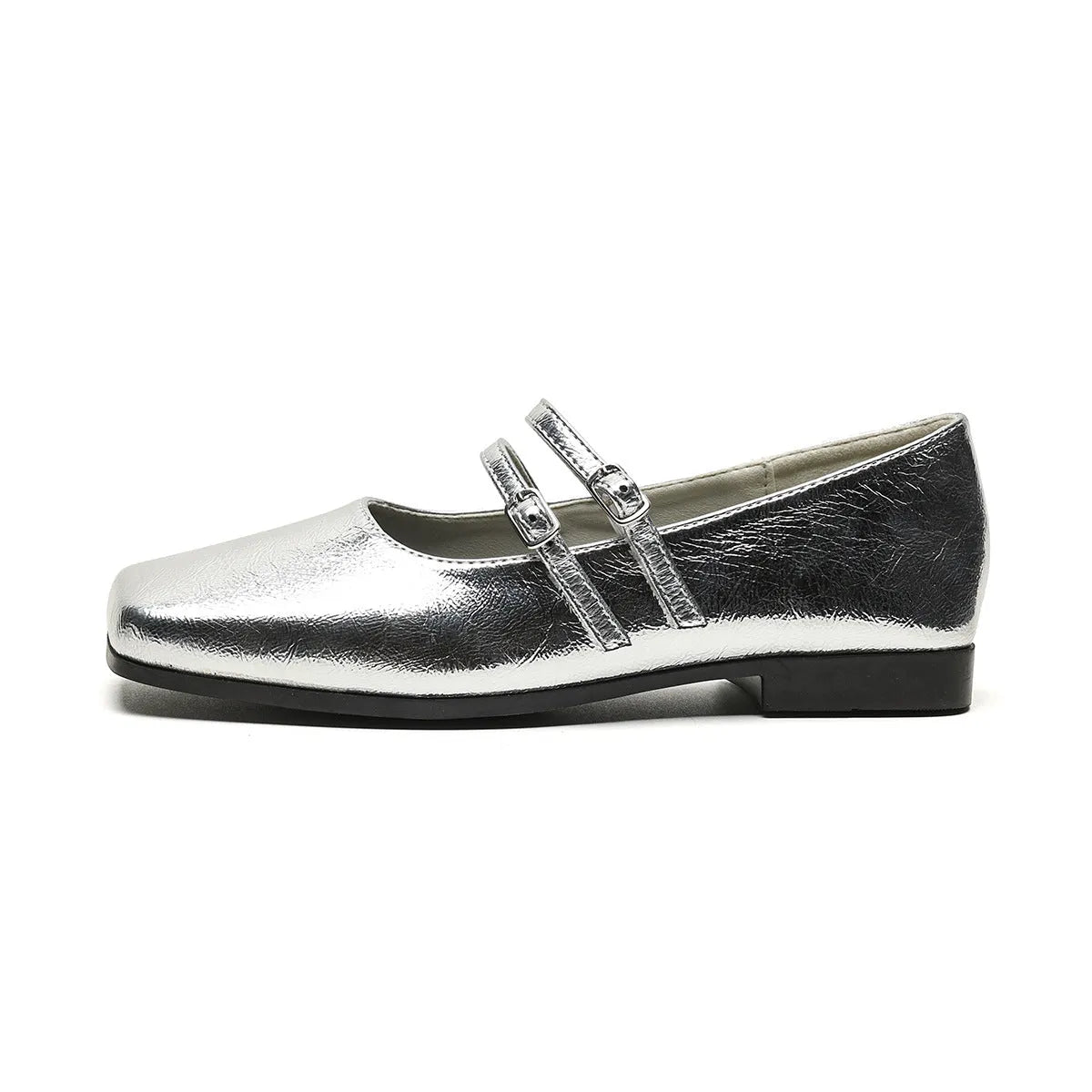 Silver women's leather ballet flats with a cross buckle strap and round toe.