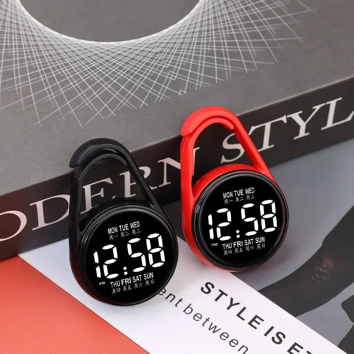 LED luminous electronic digital watch with plastic strap, shown in one of ten available colours on a wrist.