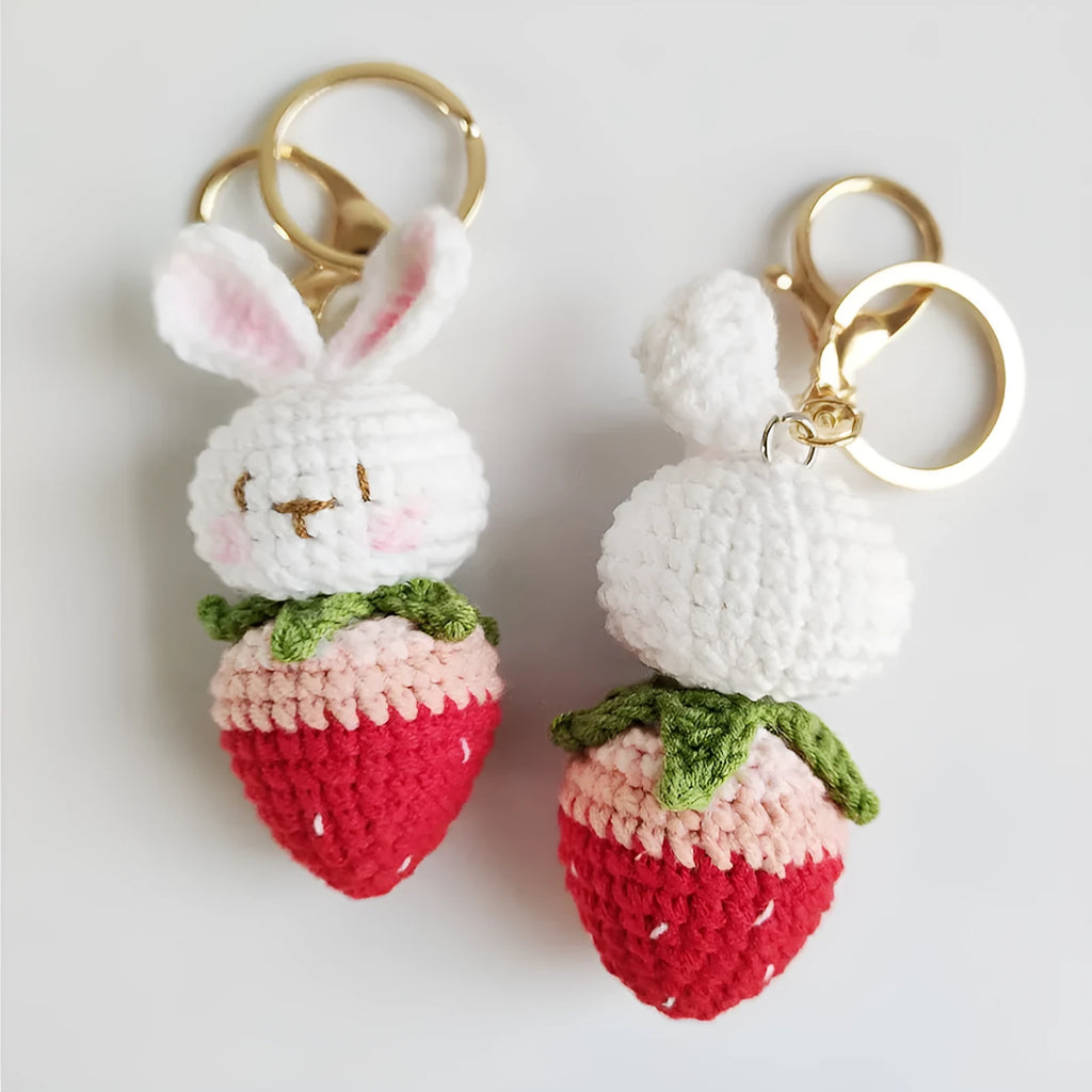 White hand-woven rabbit strawberry pendant on keychain made from doll wire
