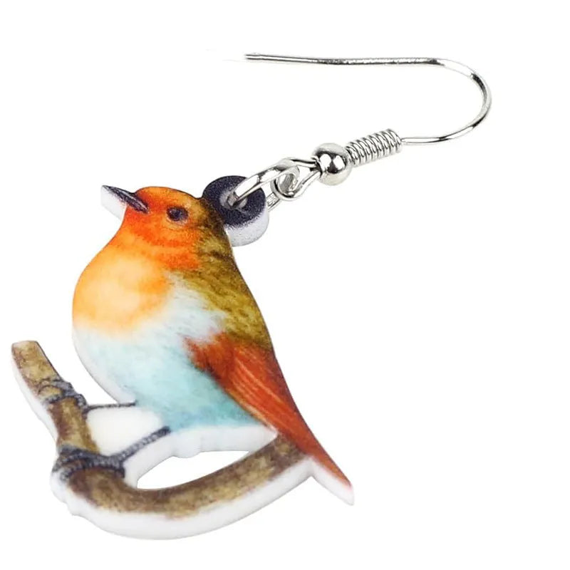 Pair of blue titmouse bird design pendant earrings made from printed acrylic.