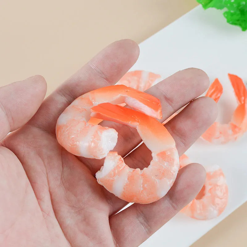 PVC injection moulded shrimp keychain with door buckle fastener on white background