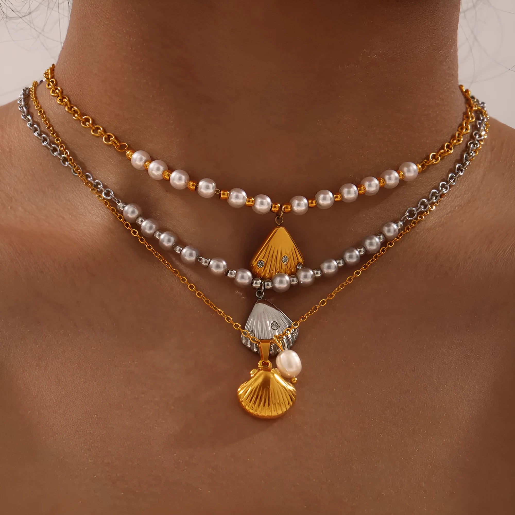 Women's titanium steel freshwater pearl necklace with vintage French shell pendant on O-shaped chain