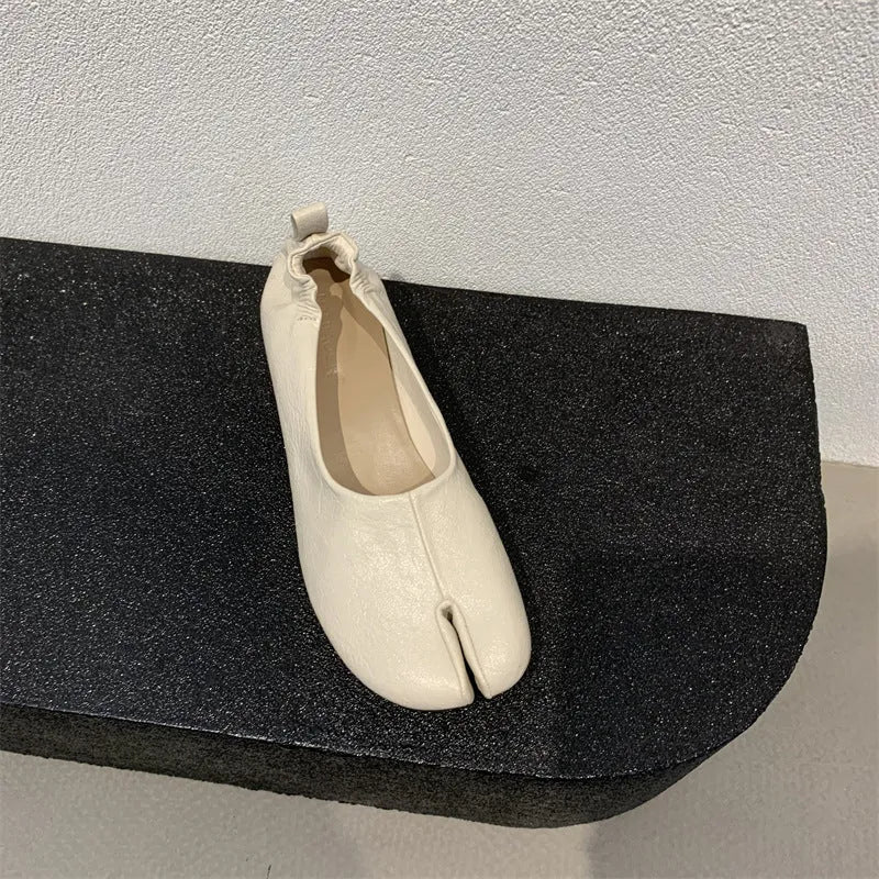 Women's apricot chunky heel pumps with a split toe horseshoe peas design and round toe.