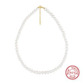 Close-up of a women's adjustable silver necklace with a single 6-7mm natural freshwater pearl pendant.