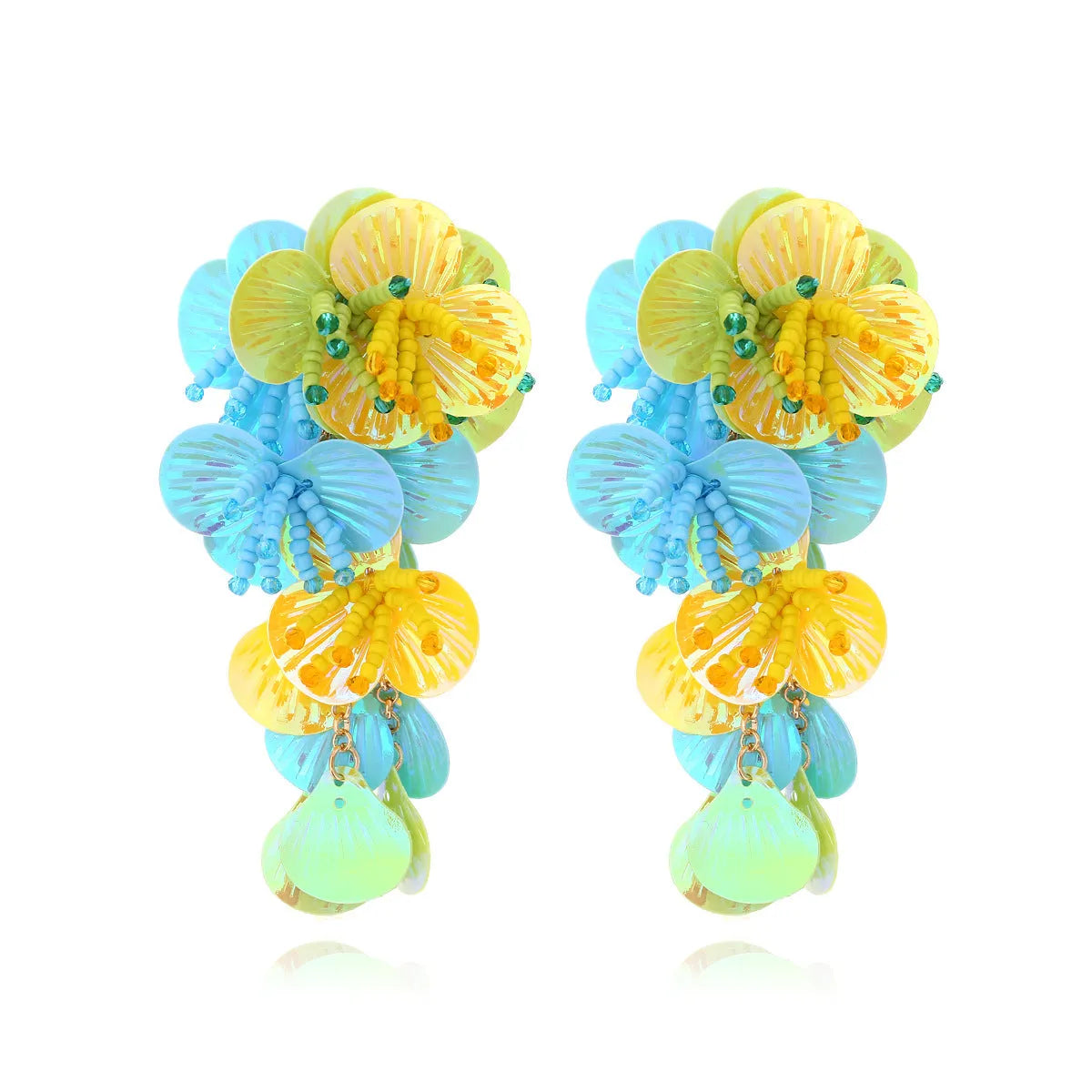 Handmade colourful bead flower and leaf drop earrings in an exaggerated oversized design.