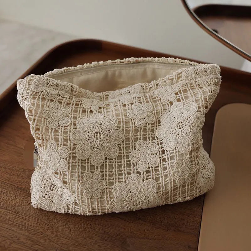 Handmade corduroy cosmetic bag with crocheted hollow flower rope weave and ethnic embroidery in solid color