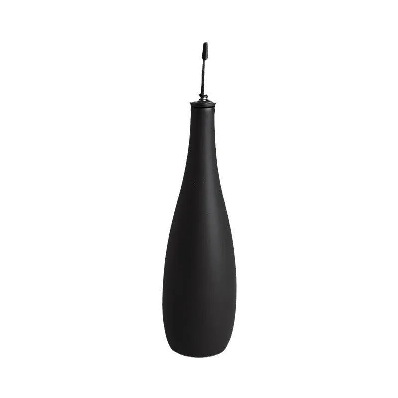 Ceramic oil pot with brush and funnel in black, coffee, or white colour, 650ml capacity.