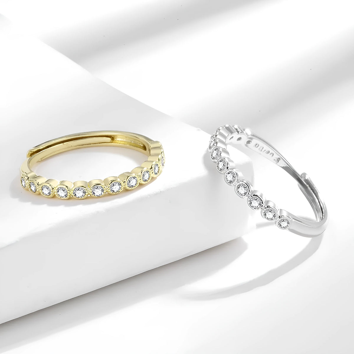Women's adjustable geometric diamond tail ring in electroplated metallic finish