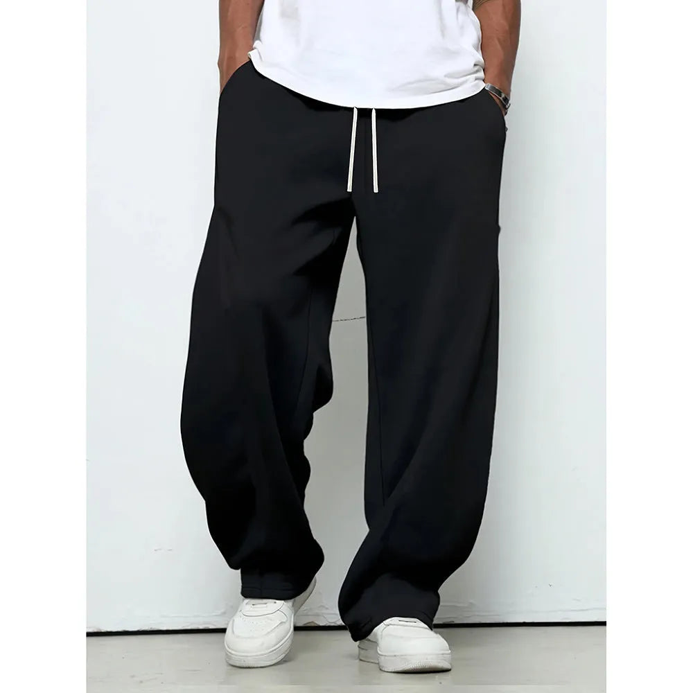 Men's straight-leg casual trousers in black polyester with a drawstring waistband.