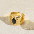 Geometric Chinese style electroplated copper ring in horse eye black colour showing structured design