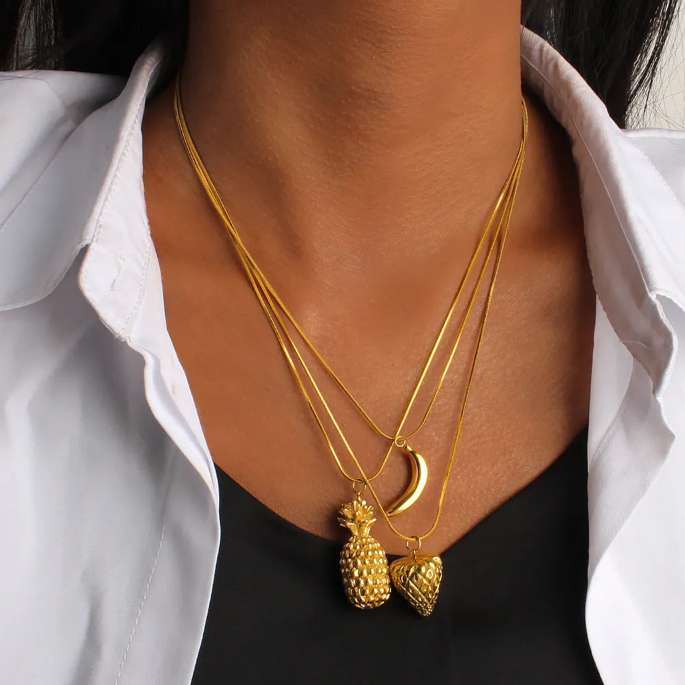 Stainless steel necklace with a fruit-shaped pendant on a regular chain.