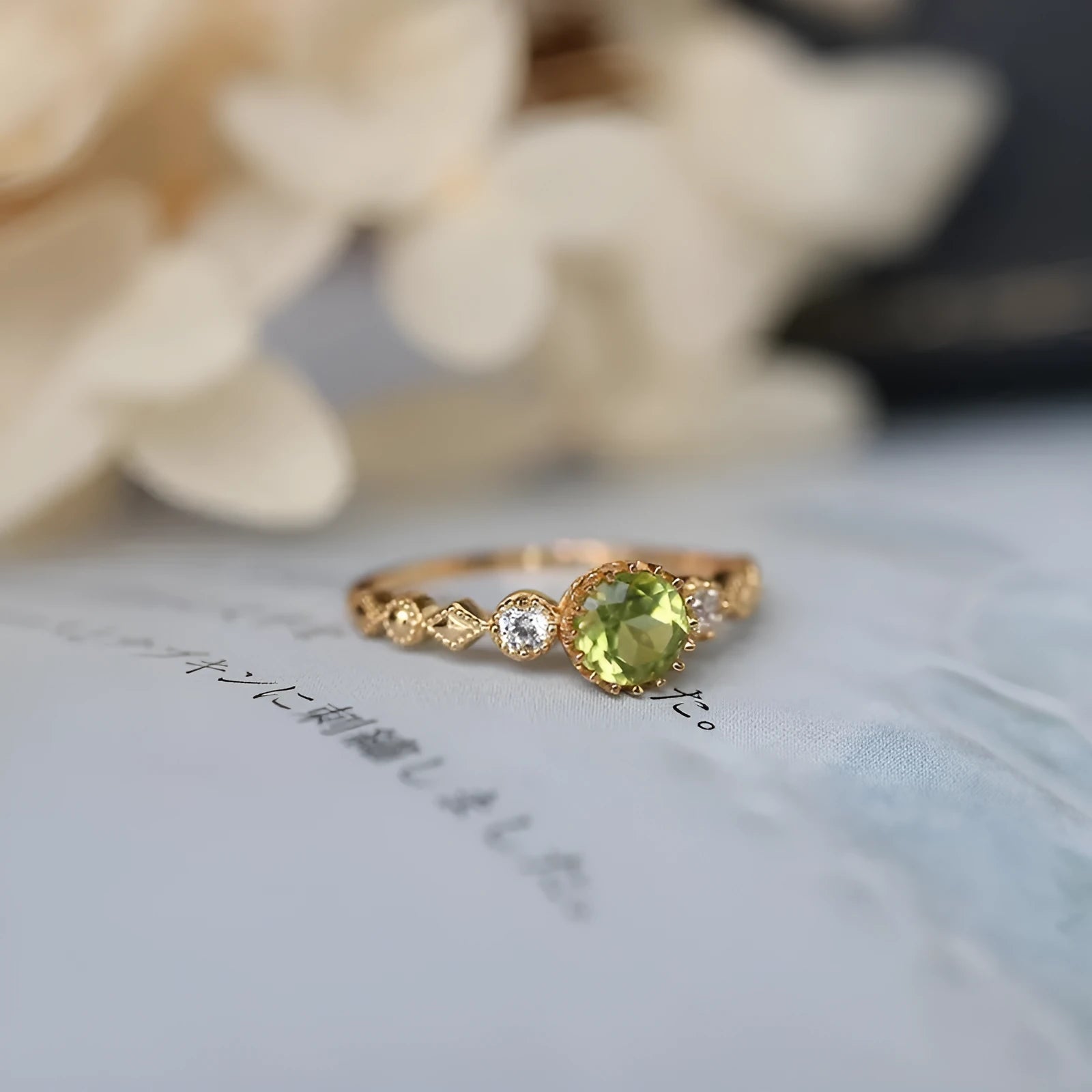 Close-up of a copper ring with a geometric quadrilateral shape and imitation peridot detail.