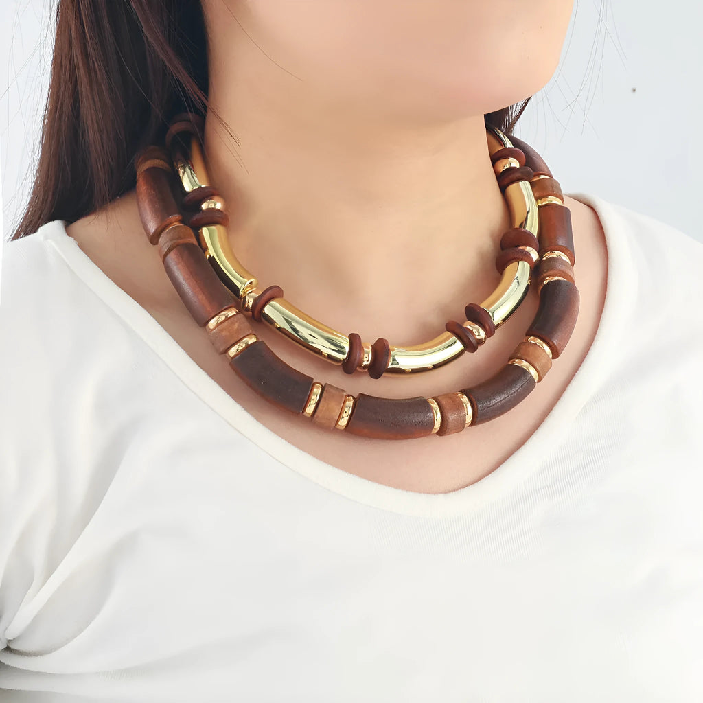 Women's layered alloy necklace and bracelet set with round pendants and regular chain design