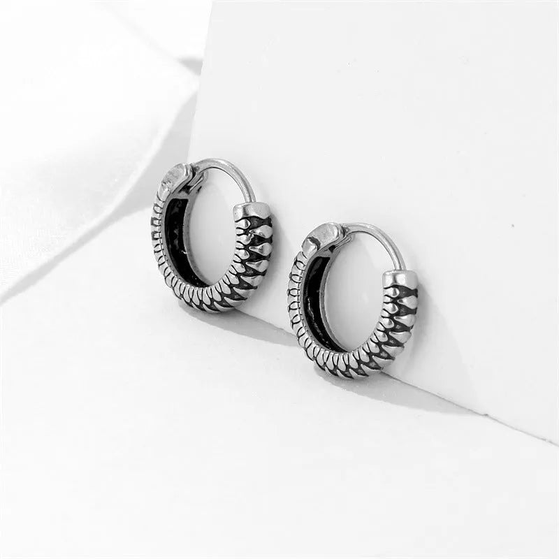 Silver geometric earrings with striped retro design made from stainless steel.