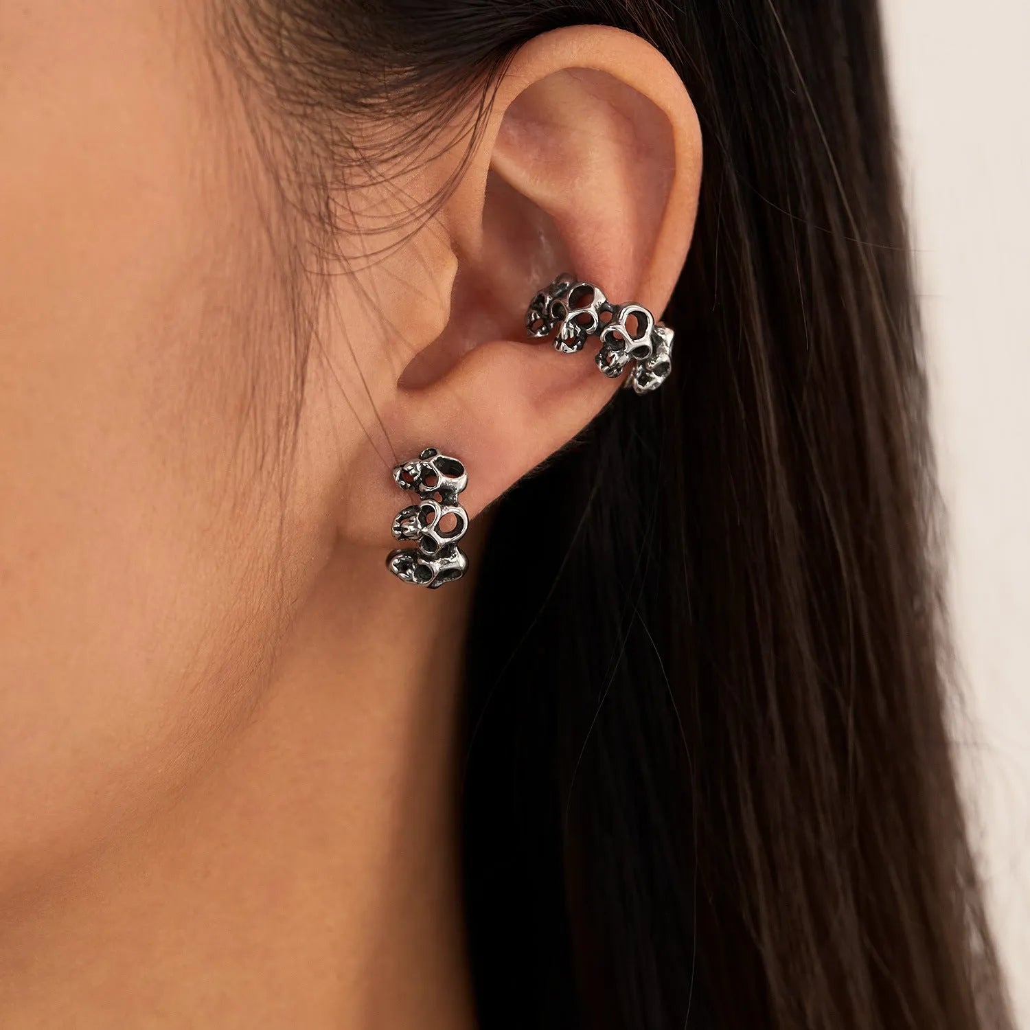 Silver stainless steel hollow skull ear clip with geometric retro design for unisex hip hop fashion