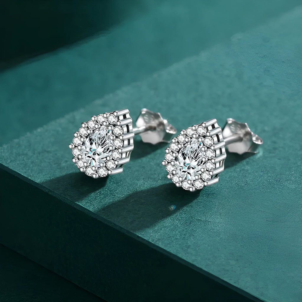 Pair of 925 sterling silver water drop shaped stud earrings with diamond process finish for women