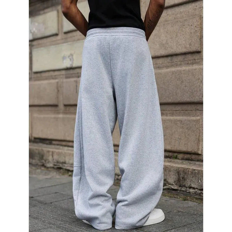 Men's high waist straight-leg casual trousers in a cropped length, shown in a neutral colour.
