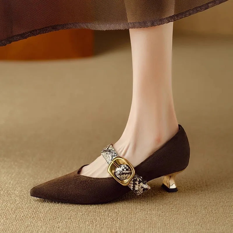 Women's black pointed stiletto heels with buckle closure and 3-5cm heel
