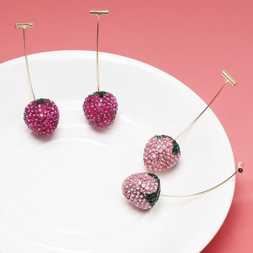 Geometric strawberry stud earrings with spot drill detailing in six colour variations