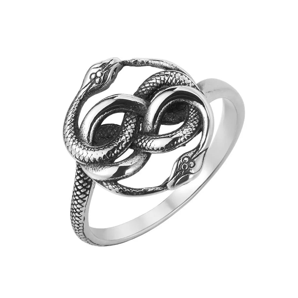 Steel-coloured titanium steel retro ring with a detailed double snake design on a finger.