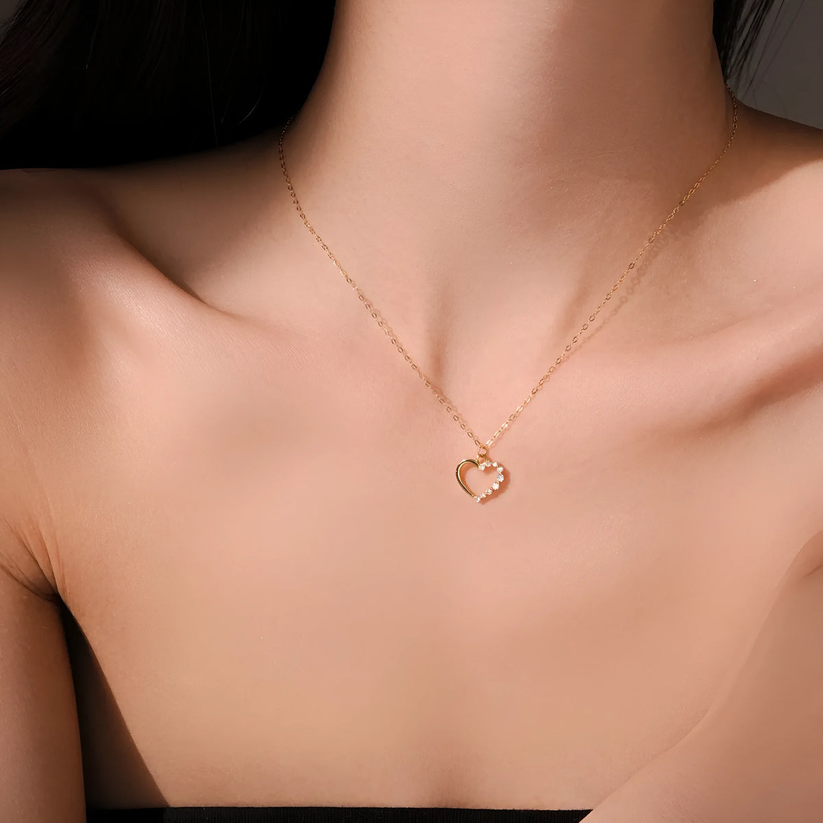 S925 sterling silver hollow heart and circle pendant necklace on a regular chain, shown in two colour finishes.