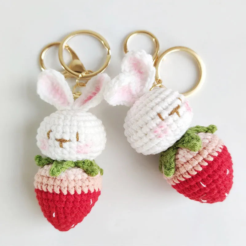 White hand-woven rabbit strawberry pendant on keychain made from doll wire