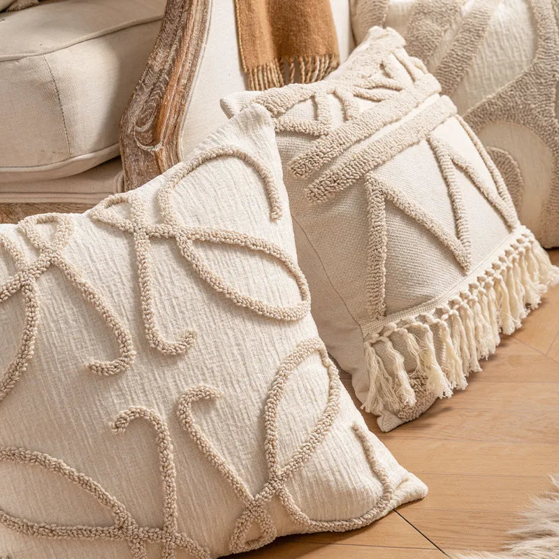 Knitted tassel pillow cover with striped pattern and bow design on home sofa