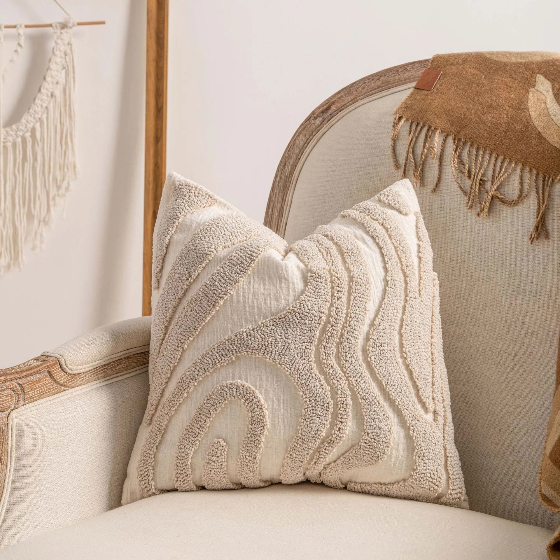 Knitted tassel pillow cover with striped pattern and bow design on home sofa