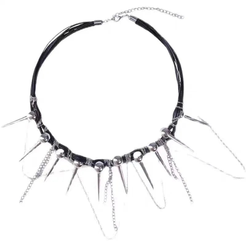 Leather necklace with round beads, a winding tassel, and silver point rivets on a white background.