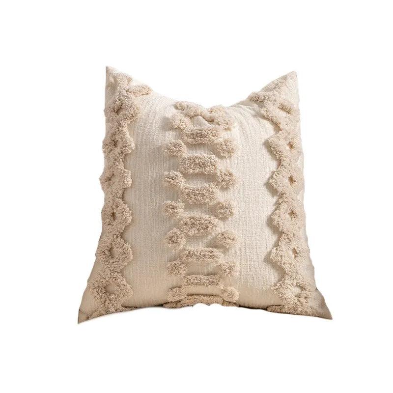 Knitted tassel pillow cover with striped pattern and bow design on home sofa