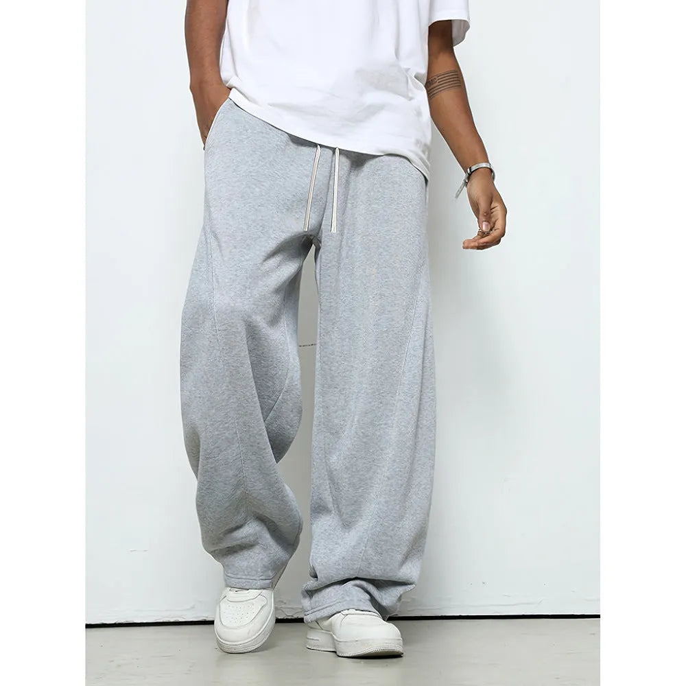 Men's straight-leg casual trousers in black polyester with a drawstring waistband.