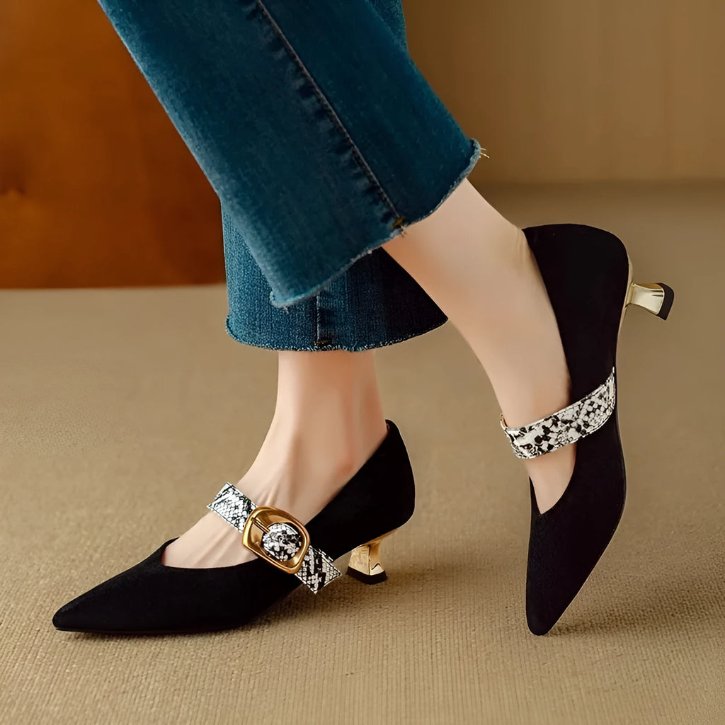 Women's black pointed stiletto heels with buckle closure and 3-5cm heel