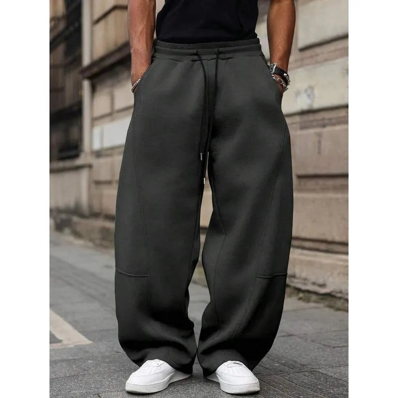 Men's high waist straight-leg casual trousers in a cropped length, shown in a neutral colour.