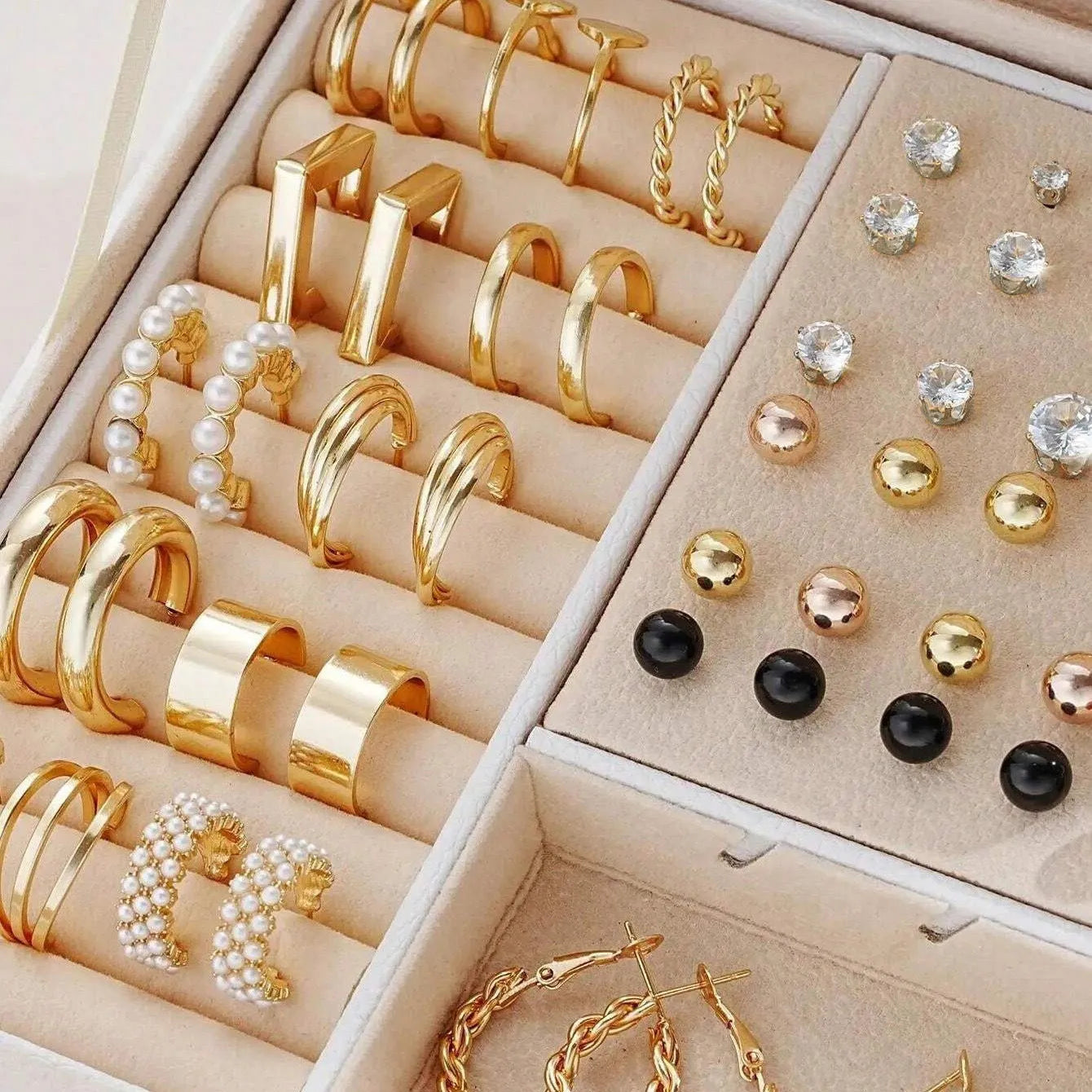 108 geometric alloy earrings with gold and yellow electroplated finishes arranged in combination set