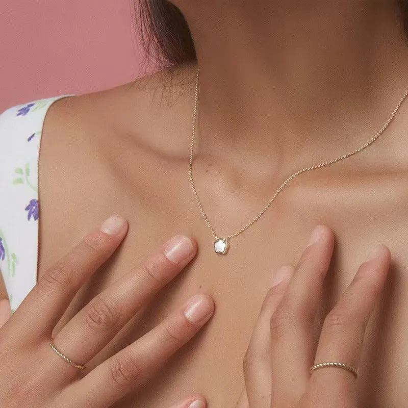 White mother shell flower necklace on copper O-chain available in gold and silver finishes for women