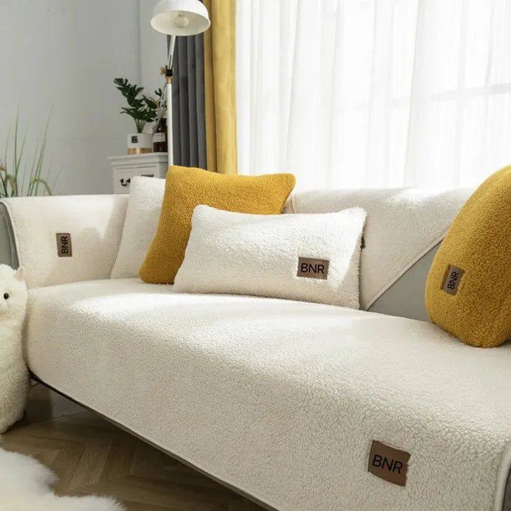 Machine washable lambswool-style sofa cover in solid colour protecting furniture
