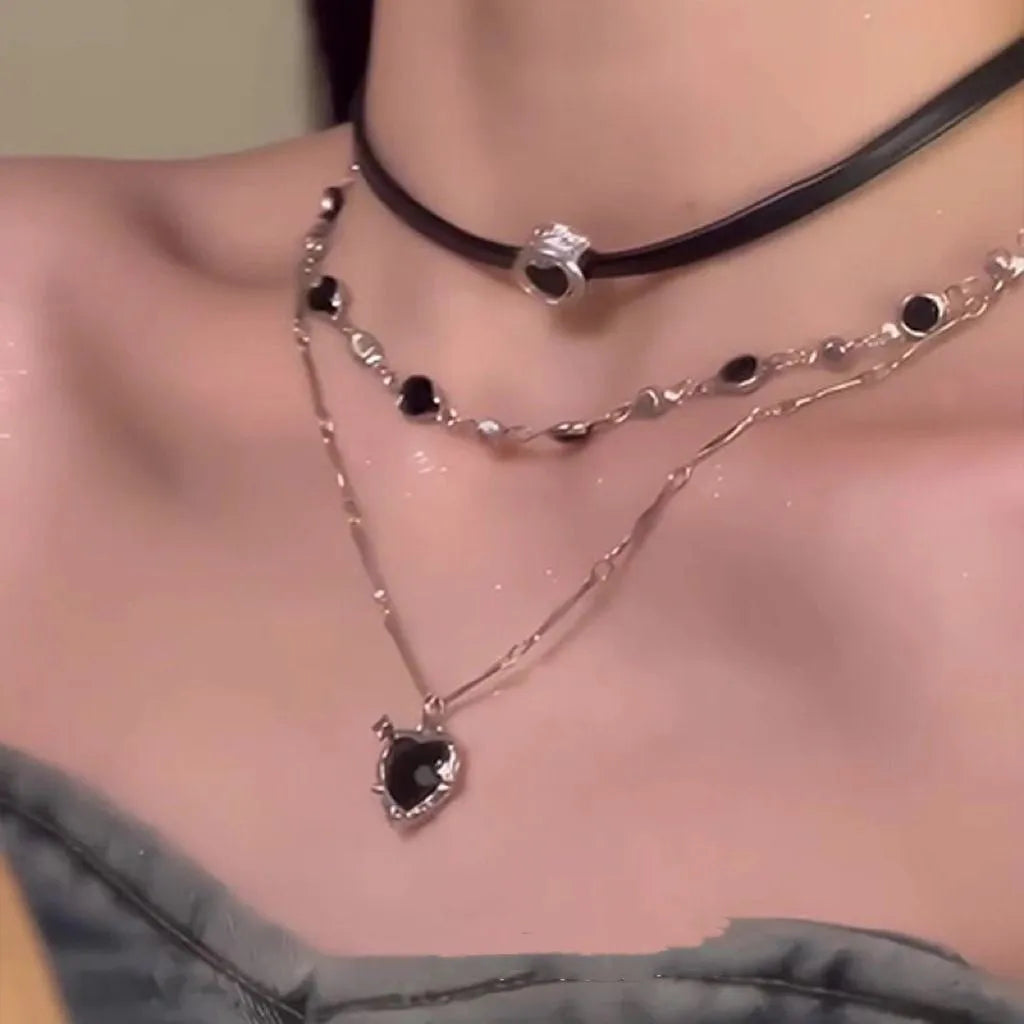 Women's multi-layer necklace set with leather heart designs and adjustable clavicle chain