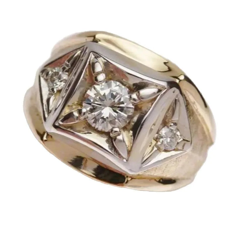 A gold-finished copper couple ring with a wide geometric hollow design and chamfered square pattern.