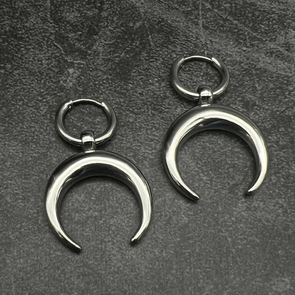 Silver alloy hoop earrings with moon detail and geometric shaping